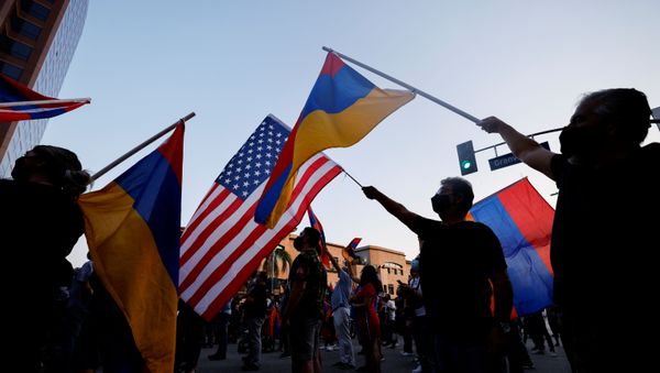 People take part in a protest by Armenian Youth Federation against what they call Azerbaijan's aggression against Armenia and the breakaway Nagorno-Karabakh region outside the Azerbaijani Consulate General in Los Angeles, California, U.S., September 30, 2020.  - Sputnik International