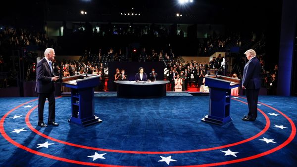 Democratic presidential nominee Joe Biden and  U.S. President Donald Trump arrive to participate in their second 2020 presidential campaign debate at Belmont University in Nashville, Tennessee, U.S., October 22, 2020. - Sputnik International