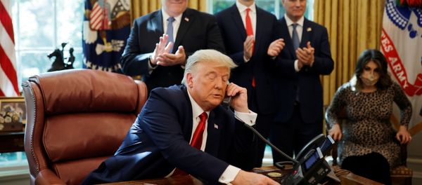 Secretary of State Mike Pompeo and White House senior advisor Jared Kushner applaud as U.S. President Donald Trump is seen on the phone with leaders of Israel and Sudan speaking about the decision to rescind Sudan's designation as a state sponsor of terrorism, in the Oval Office at the White House in Washington, U.S., October 23, 2020. REUTERS/Carlos Barria Secretary of State Mike Pompeo and White House senior advisor Jared Kushner applaud as U.S. President Donald Trump is seen on the phone with leaders of Israel and Sudan speaking about the decision to rescind Sudan's designation as a state sponsor of terrorism, in the Oval Office at the White House in Washington, U.S., October 23, 2020. REUTERS/Carlos Barria - Sputnik International