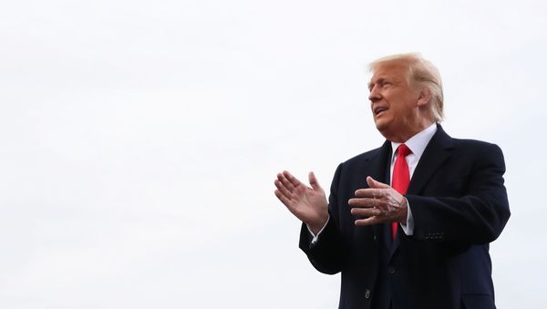 U.S. President Donald Trump arrives for a campaign rally in Londonderry, New Hampshire, U.S. October 25, 2020. - Sputnik International