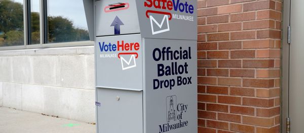 A SafeVote official ballot drop box for mail-in ballots is seen outside a polling site at the Milwaukee Public Library’s Washington Park location in Milwaukee, on the first day of in-person voting in Wisconsin, U.S., October 20, 2020. A SafeVote official ballot drop box for mail-in ballots is seen outside a polling site at the Milwaukee Public Library’s Washington Park location in Milwaukee, on the first day of in-person voting in Wisconsin, U.S., October 20, 2020. - Sputnik International