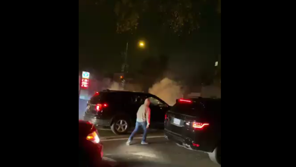 Metropolitan Police officers in Washington, DC, deploy tear gas against protesters on October 27, 2020 - Sputnik International