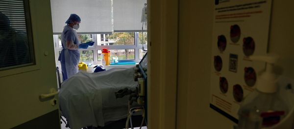 Nurses wearing protective masks and protective suits, work in the Intensive Care Unit (ICU) where patients suffering from the coronavirus disease (COVID-19) are treated at the Le Bois private hospital in Lille, France, October 28, 2020 Nurses wearing protective masks and protective suits, work in the Intensive Care Unit (ICU) where patients suffering from the coronavirus disease (COVID-19) are treated at the Le Bois private hospital in Lille, France, October 28, 2020 - Sputnik International
