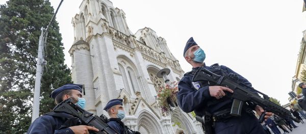 Police officers stand near Notre Dame church, where a knife attack took place, in Nice, France October 29, 2020. Police officers stand near Notre Dame church, where a knife attack took place, in Nice, France October 29, 2020. - Sputnik International