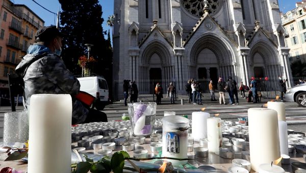 Candles and flowers near the Notre Dame church in tribute to the victims of a deadly knife attack in Nice, France, October 30, 2020. Candles and flowers near the Notre Dame church in tribute to the victims of a deadly knife attack in Nice, France, October 30, 2020. - Sputnik International