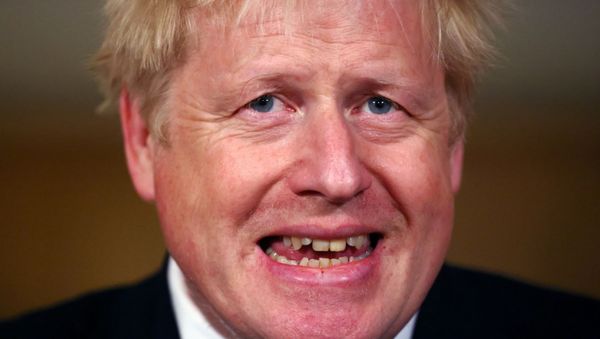 Britain's Prime Minister Boris Johnson attends a news conference amidst the spread of the coronavirus disease (COVID-19), at Downing Street in London, Britain, October 22, 2020. - Sputnik International