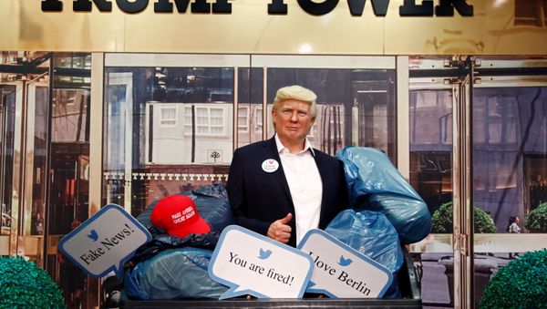 A wax figure depicting U.S. President Donald Trump is put into a dumpster at Madame Tussauds in Berlin, Germany, October 30, 2020.  - Sputnik International