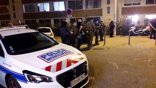 Police secures a street after a Greek Orthodox priest was shot and injured at a church in the centre of Lyon, France October 31, 2020. - Sputnik International