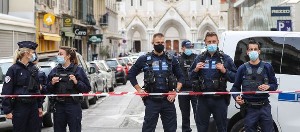 Police block the access to the Notre-Dame de l'Assomption Basilica in Nice on 29 October 2020, after a knife-wielding man kills three people at the church, slitting the throat of at least one of them, in what officials are treating as the latest jihadist attack to rock the country. (Photo by Valery HACHE / AFP) - Sputnik International
