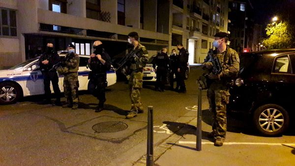 Police secures a street after a Greek Orthodox priest was shot and injured at a church in the centre of Lyon, France October 31, 2020.  - Sputnik International