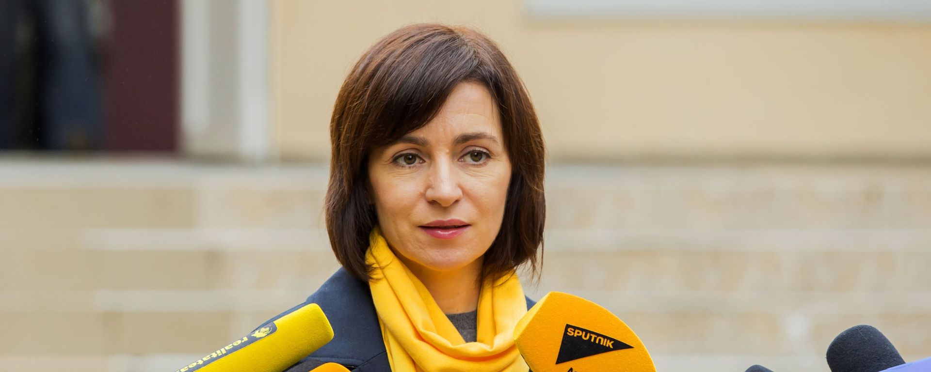 Prime Minister of the Republic of Moldova Maia Sandu answers questions from reporters during the elections at the polling station in Chisinau on October 20, 2019 during the local government elections in Moldova. - Sputnik International, 1920, 15.09.2025