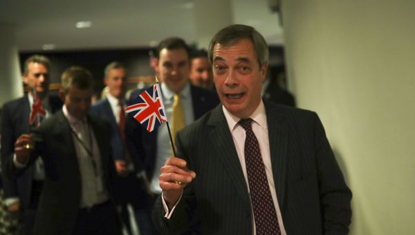 British European Parliament member Nigel Farage leaves the hemicycle after addressing European lawmakers during the plenary session at the European Parliament in Brussels, Wednesday, Jan. 29, 2020 - Sputnik International