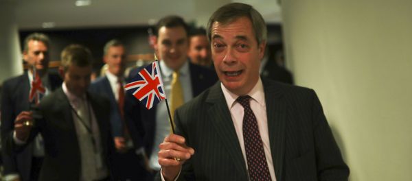 British European Parliament member Nigel Farage leaves the hemicycle after addressing European lawmakers during the plenary session at the European Parliament in Brussels, Wednesday, Jan. 29, 2020 - Sputnik International