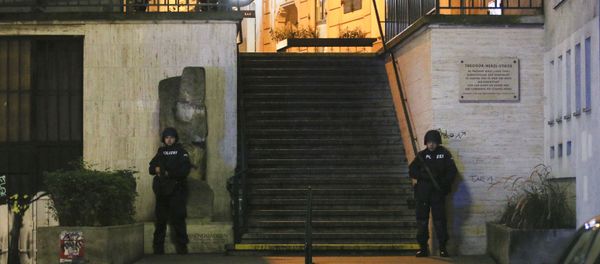 Police officers remain in position at the Theodor Herzl Stiege, a set of stairs near a synagogue after gunshots were heard, in Vienna, Monday, 2 November 2020. Austrian police say several people have been injured and officers are out in force after gunfire in the capital Vienna. Initial reports that a synagogue was the target of an attack couldn't immediately be confirmed. Austrian news agency APA quoted the country's Interior Ministry saying one attacker has been killed and another could be on the run. Police officers remain in position at the Theodor Herzl Stiege, a set of stairs near a synagogue after gunshots were heard, in Vienna, Monday, 2 November 2020. Austrian police say several people have been injured and officers are out in force after gunfire in the capital Vienna. Initial reports that a synagogue was the target of an attack couldn't immediately be confirmed. Austrian news agency APA quoted the country's Interior Ministry saying one attacker has been killed and another could be on the run. - Sputnik International