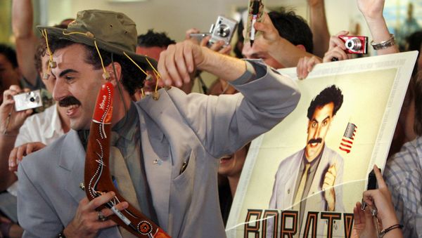 British actor Sacha Baron Cohen, in character as a Kazakh TV reporter known as 'Borat', holds a boomerang as he mingles with fans in Sydney November 13, 2006 during the Australian premiere of his film Borat: Cultural Learnings of America for Make Benefit Glorious Nation of Kazakhstan. British actor Sacha Baron Cohen, in character as a Kazakh TV reporter known as 'Borat', holds a boomerang as he mingles with fans in Sydney November 13, 2006 during the Australian premiere of his film Borat: Cultural Learnings of America for Make Benefit Glorious Nation of Kazakhstan. - Sputnik International