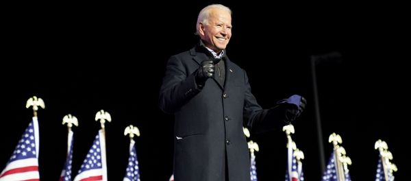 Democratic US presidential nominee and former Vice President Joe Biden smile during a drive-in campaign rally at Heinz Field in Pittsburgh, Pennsylvania, US, November 2, 2020 - Sputnik International