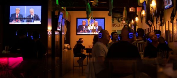 U.S. President Donald Trump and Democratic presidential candidate Joe Biden's presidential debate is broadcast on television and watched at a tavern in San Diego, California, U.S., October 22, 2020 U.S. President Donald Trump and Democratic presidential candidate Joe Biden's presidential debate is broadcast on television and watched at a tavern in San Diego, California, U.S., October 22, 2020 - Sputnik International