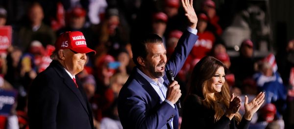 Kimberly Guilfoyle and Donald Trump Jr. wave and clap next to U.S. President Donald Trump during a campaign rally at Kenosha Regional Airport in Kenosha, Wisconsin, U.S., November 2, 2020. - Sputnik International