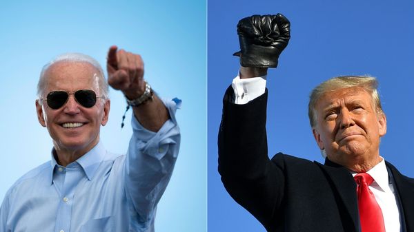 This combination of pictures created on October 30, 2020 shows Democratic Presidential candidate and former US Vice President Joe Biden gestures prior to delivering remarks at a Drive-in event in Coconut Creek, Florida, on October 29, 2020 and US President Donald Trump pumps his fist as he arrives to a campaign rally at Green Bay Austin Straubel International Airport in Green Bay, Wisconsin on October 30, 2020. This combination of pictures created on October 30, 2020 shows Democratic Presidential candidate and former US Vice President Joe Biden gestures prior to delivering remarks at a Drive-in event in Coconut Creek, Florida, on October 29, 2020 and US President Donald Trump pumps his fist as he arrives to a campaign rally at Green Bay Austin Straubel International Airport in Green Bay, Wisconsin on October 30, 2020. - Sputnik International