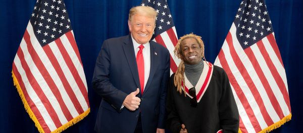American rapper Lil Wayne poses for a photo with US President Donald Trump at the president's resort in Doral, Florida, on 29 October. American rapper Lil Wayne poses for a photo with US President Donald Trump at the president's resort in Doral, Florida, on 29 October. - Sputnik International