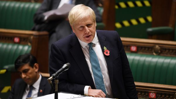 A handout photograph released by the UK Parliament shows Britain's Prime Minister Boris Johnson speaking in the House of Commons in London on November 2, 2020 on new coronavirus lockdown measures. A handout photograph released by the UK Parliament shows Britain's Prime Minister Boris Johnson speaking in the House of Commons in London on November 2, 2020 on new coronavirus lockdown measures. - Sputnik International