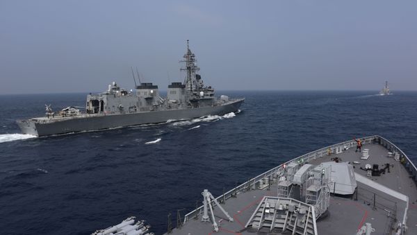 This handout photo taken and released by the Indian Navy on November 3, 2020 shows ships taking part in the Malabar exercise in the Bay of Bengal. - India, Australia, Japan and the United States started a strategic navy drill on November 3 in the Bay of Bengal, with all four countries keeping a wary eye on China's growing military power. - Sputnik International