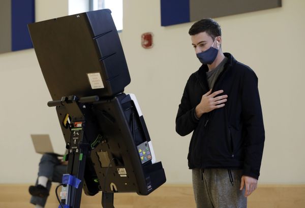 A young voter visits a polling station in Washington. A young voter visits a polling station in Washington. - Sputnik International