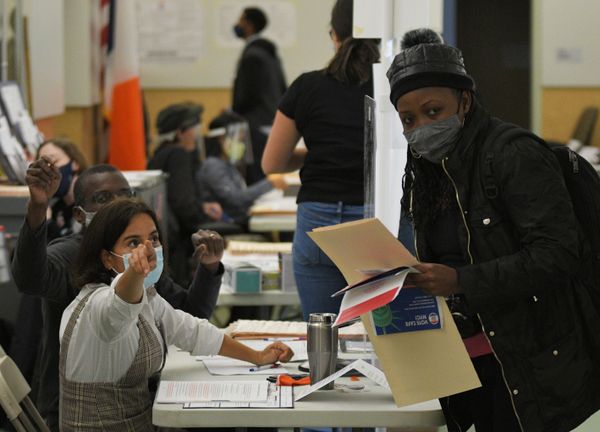 A woman prepares to vote at a polling station in New York. A woman prepares to vote at a polling station in New York. - Sputnik International