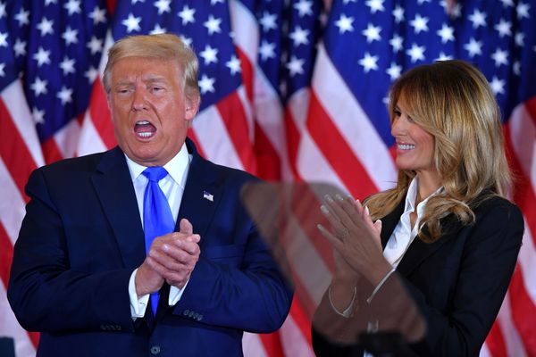 US President Donald Trump claps alongside First Lady Melania Trump after speaking during election night in the East Room of the White House in Washington, DC, early on 4 November 2020. US President Donald Trump claps alongside First Lady Melania Trump after speaking during election night in the East Room of the White House in Washington, DC, early on 4 November 2020. - Sputnik International