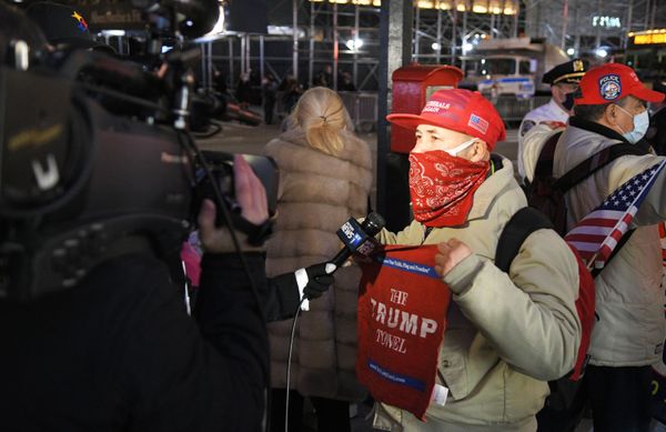 Trump supporter talks to journalists near the Trump Tower in New York City on Election Day. Trump supporter talks to journalists near the Trump Tower in New York City on Election Day. - Sputnik International