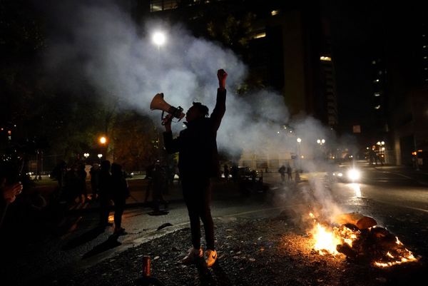 A protester yells after a march to the Mark O Hatfield United States Courthouse on the night of the election, in Portland, Oregon, Tuesday 3 November 2020. A protester yells after a march to the Mark O Hatfield United States Courthouse on the night of the election, in Portland, Oregon, Tuesday 3 November 2020. - Sputnik International