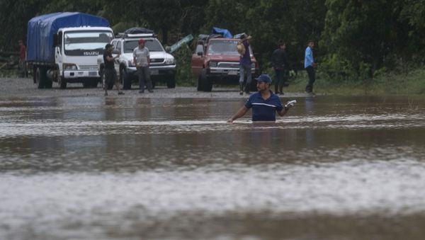 A man walks through a flooded road in Okonwas, Nicaragua, Wednesday, Nov. 4, 2020. Eta weakened from the Category 4 hurricane to a tropical storm after lashing Nicaragua's Caribbean coast for much of Tuesday, its floodwaters isolating already remote communities and setting off deadly landslides.  - Sputnik International
