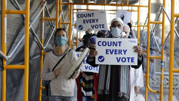Protestors who want every vote counted from the 2020 presidential election, march down Woodward Avenue on November 4, 2020 in Detroit, Michigan. - Sputnik International