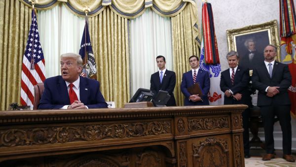 President Donald Trump speaks during a law enforcement briefing on the MS-13 gang in the Oval Office of the White House, Wednesday, July 15, 2020, in Washington. FBI Director Christopher Wray, is second from right.  - Sputnik International