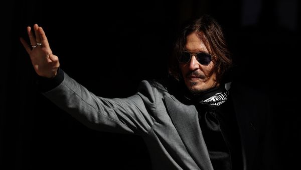 US actor Johnny Depp arrives at the High Court in London in London, Tuesday, July 28, 2020. Hollywood actor Johnny Depp is suing News Group Newspapers over a story about his former wife Amber Heard, published in The Sun in 2018 which branded him a 'wife beater', a claim he denies. US actor Johnny Depp arrives at the High Court in London in London, Tuesday, July 28, 2020. Hollywood actor Johnny Depp is suing News Group Newspapers over a story about his former wife Amber Heard, published in The Sun in 2018 which branded him a 'wife beater', a claim he denies. - Sputnik International