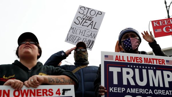 Supporters of U.S. president Donald Trump rally as votes continue to be counted following the 2020 U.S. presidential election, in Detroit, Michigan, U.S., November 5, 2020.   - Sputnik International