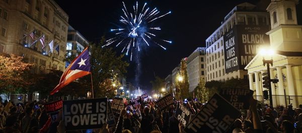 People light fireworks after news media declared Democratic candidate Joe Biden to be the winner of the 2020 U.S. presidential election, at BLM Plaza in Washington, DC, U.S., November 7, 2020 - Sputnik International