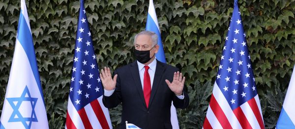 Israeli Prime Minister Benjamin Netanyahu attends a ceremony to sign amendments to a series of scientific cooperation agreements with U.S. Ambassador to Israel David Friedman, at Ariel University, in the West Bank settlement of Ariel, Wednesday, Oct. 28, 2020.  - Sputnik International
