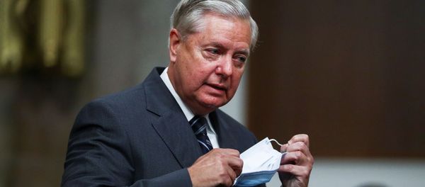 Senate Judiciary Committee Chairman Lindsey Graham (R-SC) arrives for a Senate Judiciary Committee meeting on the nomination of Judge Amy Coney Barrett to be an associate justice of the U.S. Supreme Court on Capitol Hill in Washington, U.S., October 22, 2020.  - Sputnik International