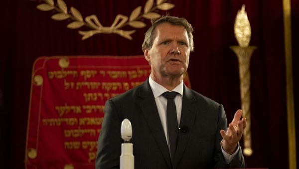 Rene de Reuver, speaking on behalf of the General Synod of the Protestant Church in the Netherlands, reads a statement at the Rav Aron Schuster Synagogue in Amsterdam, Netherlands, Sunday, Nov. 8, 2020.The Dutch Protestant Church made a far-reaching confession of guilt Sunday for its failure to do more to help Jews during and after World War II and even for the church's role in preparing the ground in which the seeds of anti-Semitism and hatred could grow. The statement came at a solemn ceremony to mark Monday's anniversary of the Nazis' anti-Jewish Kristallnacht, or Night of Broken Glass, pogrom in Germany and Austria.  - Sputnik International