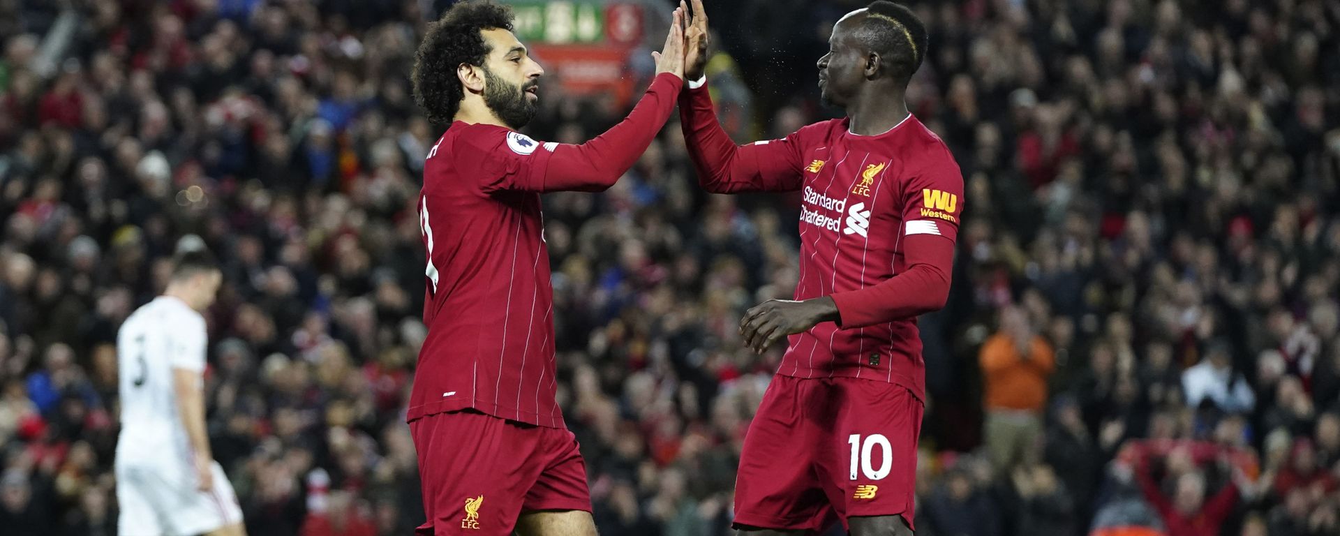 Liverpool's Mohamed Salah, front left, celebrates with Liverpool's Sadio Mane after scoring his side's opening goal during the English Premier League soccer match between Liverpool and Sheffield United at Anfield Stadium, Liverpool, England, Thursday, Jan. 2, 2020 Liverpool's Mohamed Salah, front left, celebrates with Liverpool's Sadio Mane after scoring his side's opening goal during the English Premier League soccer match between Liverpool and Sheffield United at Anfield Stadium, Liverpool, England, Thursday, Jan. 2, 2020 - Sputnik International, 1920, 31.01.2023