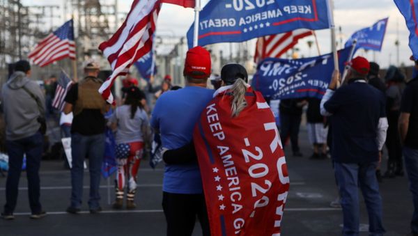 Supporters of US President Donald Trump gather at a Stop the Steal protest after the 2020 US presidential election was called for former Vice President Joe Biden, in front of the Maricopa County Tabulation and Election Center (MCTEC), in Phoenix, Arizona, 8 November 2020 - Sputnik International