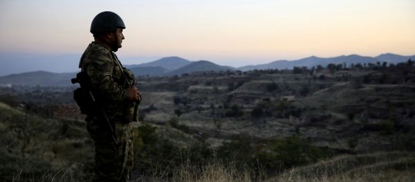 An Azeri soldier inspects the city of Cebrayil, where Azeri forces regained control during the fighting over the breakaway region of Nagorno-Karabakh, Azerbaijan October 16, 2020 An Azeri soldier inspects the city of Cebrayil, where Azeri forces regained control during the fighting over the breakaway region of Nagorno-Karabakh, Azerbaijan October 16, 2020 - Sputnik International