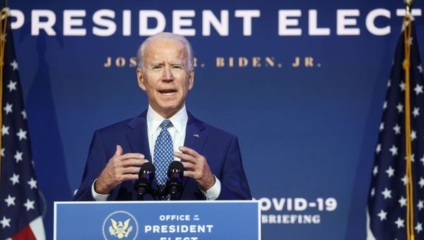 U.S. President-elect Joe Biden speaks to reporters about efforts to confront the coronavirus disease (COVID-19) pandemic after meeting with members of his Transition COVID-19 Advisory Board in Wilmington, Delaware, U.S., November 9, 2020. REUTERS/Jonathan Ernst - Sputnik International