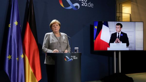 German Chancellor Angela Merkel attends a virtual news conference with French president Emmanuel Macron, on the screen, Austrian Chancellor Sebastian Kurz, Netherlands Prime Minister Mark Rutte, European Commission President Ursula von der Leyen and European Council President Charles Michel, at the chancellery in Berlin, Germany November 10, 2020 - Sputnik International