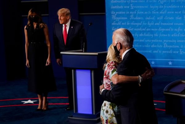 Democrat presidential candidate, former vice-president Joe Biden hugs wife Jill while US President Donald Trump stands with first lady Melania after the second and final presidential debate at the Curb Event Center at Belmont University in Nashville, Tennessee, US, 22 October 2020. Democrat presidential candidate, former vice-president Joe Biden hugs wife Jill while US President Donald Trump stands with first lady Melania after the second and final presidential debate at the Curb Event Center at Belmont University in Nashville, Tennessee, US, 22 October 2020. - Sputnik International