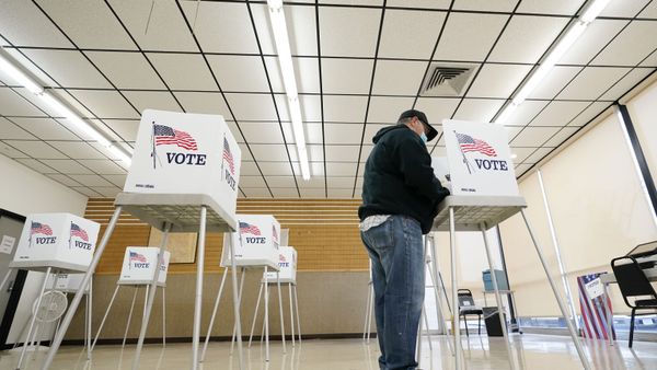 In this Oct. 20, 2020, file photo, Kelly Wingfield, of Urbandale, Iowa, fills out his ballot during early voting for the general election in Adel, Iowa. As it has for more than 170 years, The Associated Press will count the vote and report the results of presidential, congressional and state elections quickly, accurately and without fear or favor on Nov. 3 and beyond. - Sputnik International