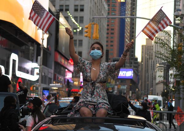 A girl in New York City reacts after the media had forecast Democrat candidate Joe Biden as winner in the US presidential election. 7 November 2020. A girl in New York City reacts after the media had forecast Democrat candidate Joe Biden as winner in the US presidential election. 7 November 2020. - Sputnik International
