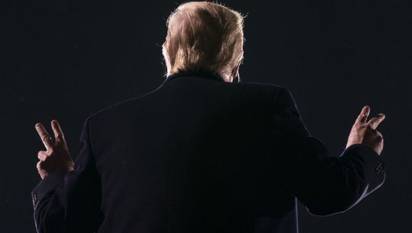 US President Donald Trump acknowledges his audience as he addresses supporters during a Make America Great Again campaign event at Des Moines International Airport in Des Moines, Iowa on 14 October 2020. US President Donald Trump acknowledges his audience as he addresses supporters during a Make America Great Again campaign event at Des Moines International Airport in Des Moines, Iowa on 14 October 2020. - Sputnik International