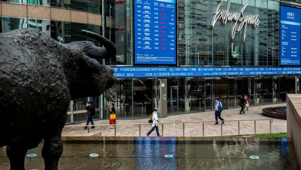 Electronic boards display various stock prices at Exchange Square in Hong Kong on March 9, 2020 - Sputnik International